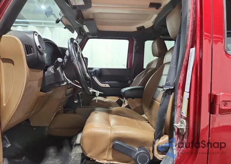 2011 Jeep Wrangler Unlimited Sahara z USA, uszkodzony, nr VIN 1J4BA5H12BL572554